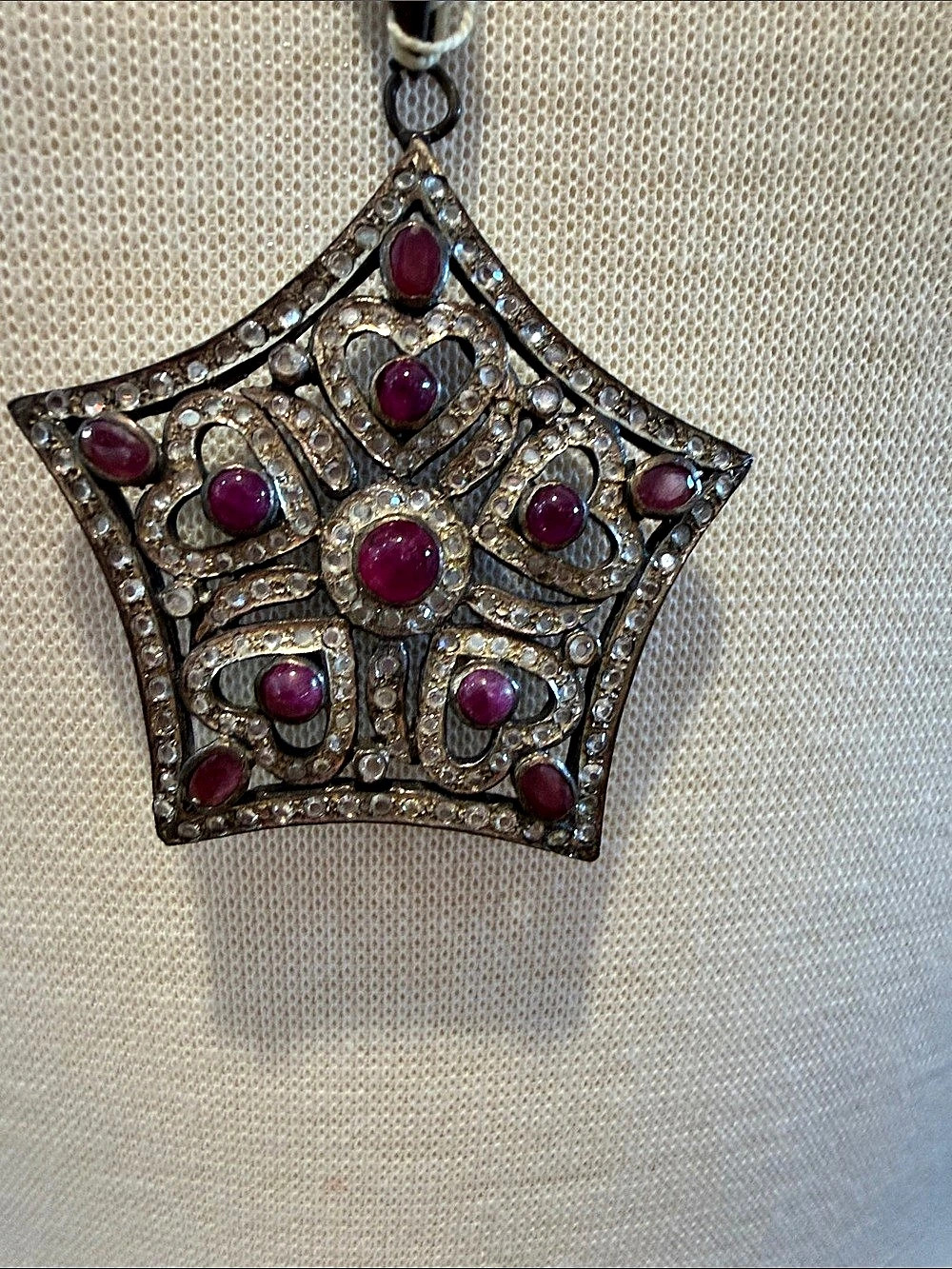 Ruby-Tone Jeweled Brooch Pendant .59
diamonds